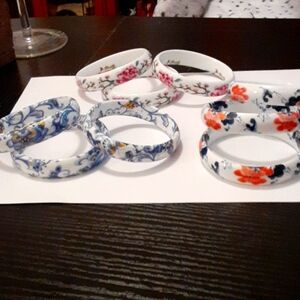 Nine ceramic bangles.